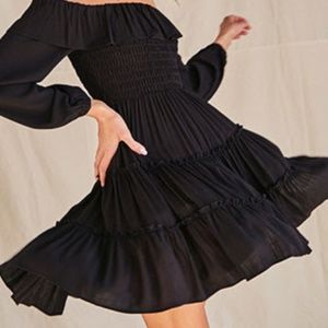 Off the shoulder tiered mini dress